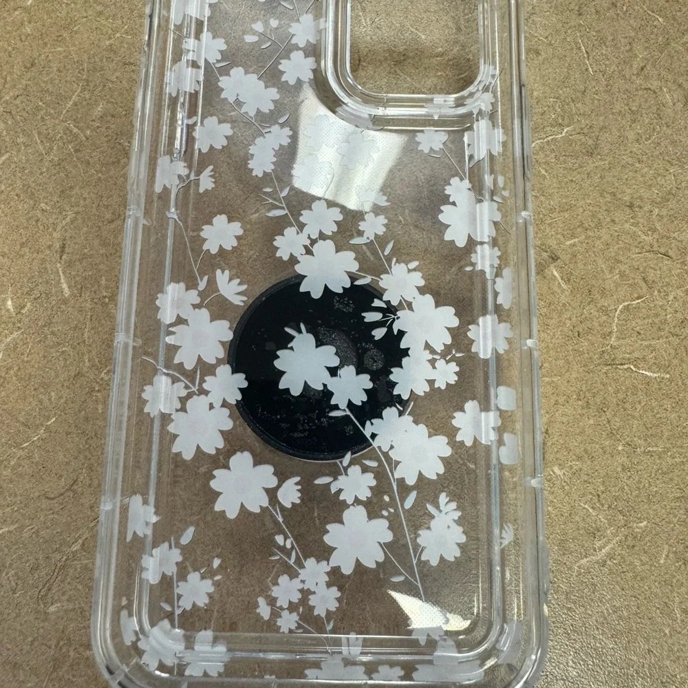 iPhone 12 Pro with pop socket.